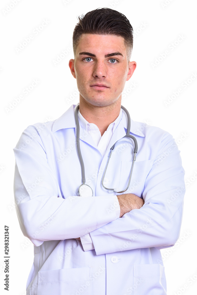 Close up of young handsome man doctor with arms crossed Close up of young handsome man doctor with arms crossed