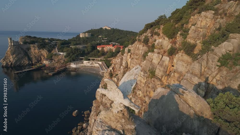 Aerial view bird sculpture in cliff in Crimea near Swallow nest castle Aerial view bird sculpture in cliff in Crimea near Swallow nest castle
