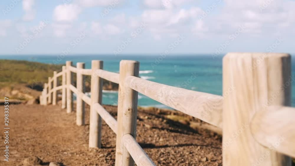 Wood fence in top of Caribbean cliff Wood fence in top of Caribbean cliff