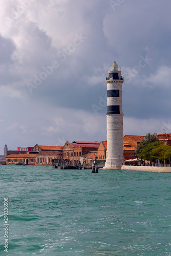 Old stone lighthouse on the island of Murano.