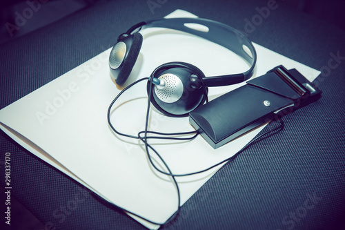 headphones used for simultaneous translation equipment simultaneous interpretation equipment . A set of headphones for simultaneous translation during negotiations in foreign languages. photo