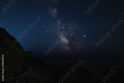 Starry sky at night on the sea coast © Vladimir Muravin