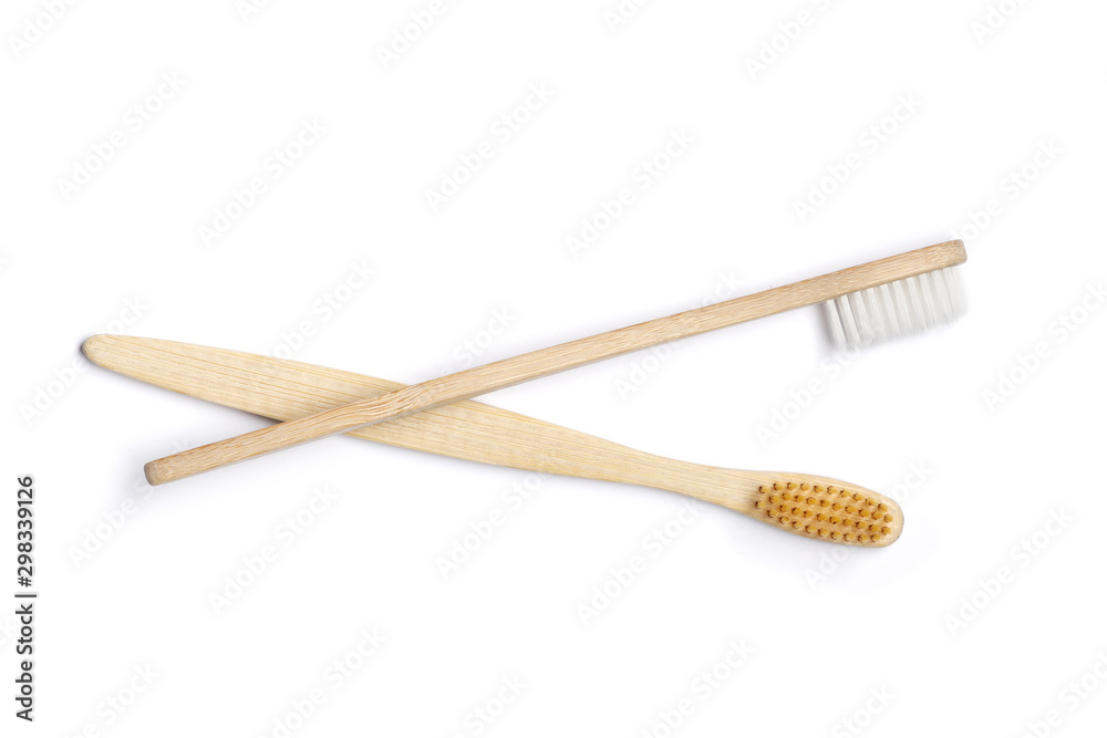 Two Bamboo toothbrushes on white background. Dental care Two Bamboo toothbrushes on white background. Dental care