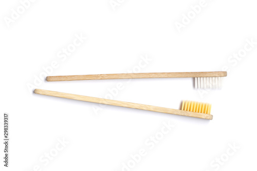 Two Bamboo toothbrushes on white background. Dental care