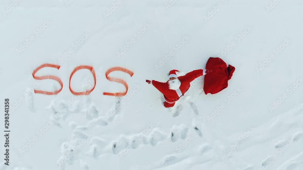 Santa Claus is asking for help in the snow