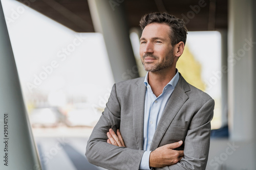 Portrait of confident businessman outdoors