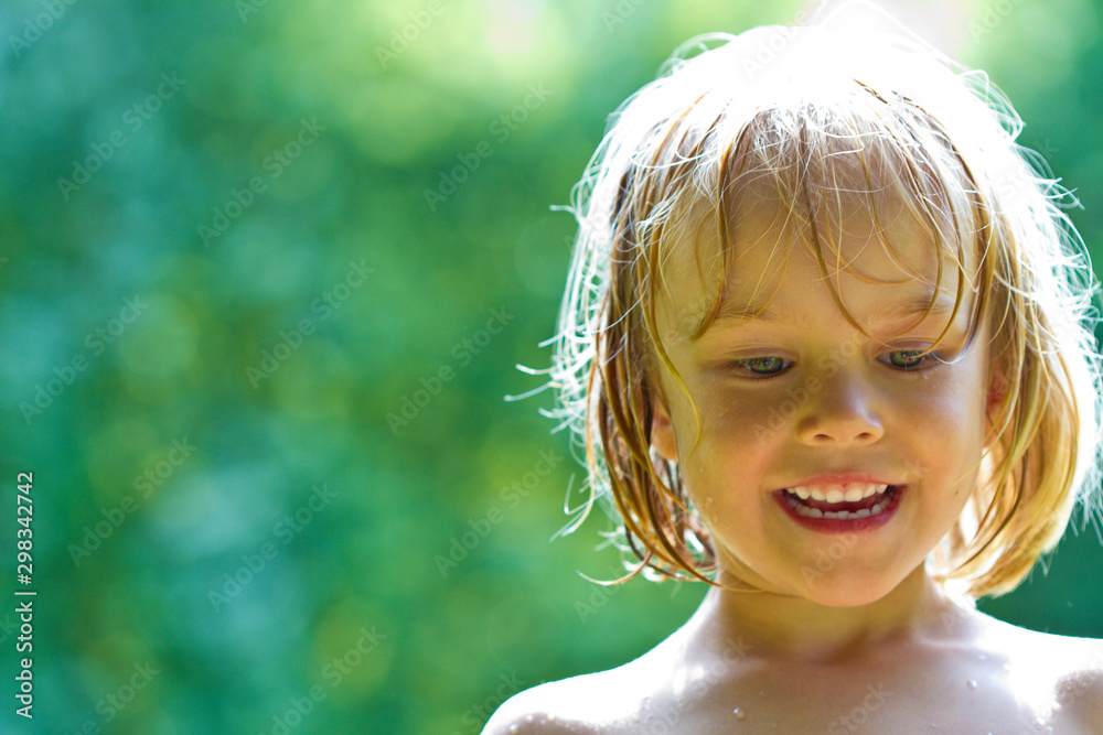 Portrait of smiling little girl with wet hairs Portrait of smiling little girl with wet hairs