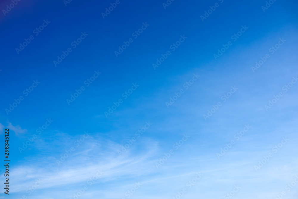Fototapeta premium Blue sky with clouds and background