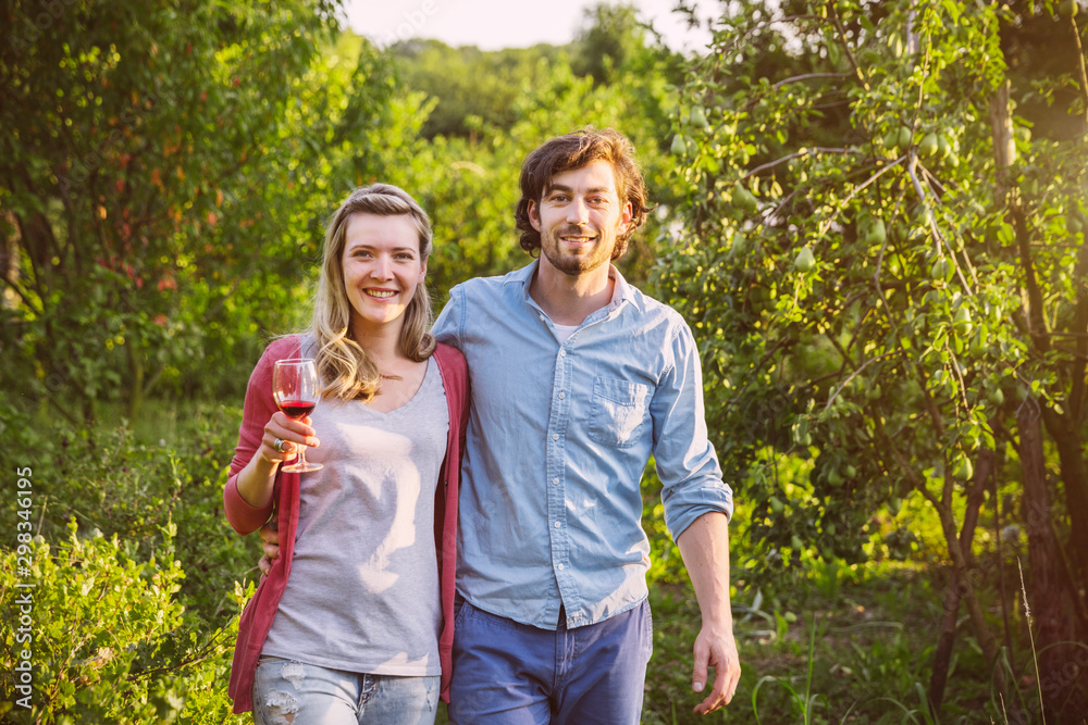 Portrait of couple in garden in evening light