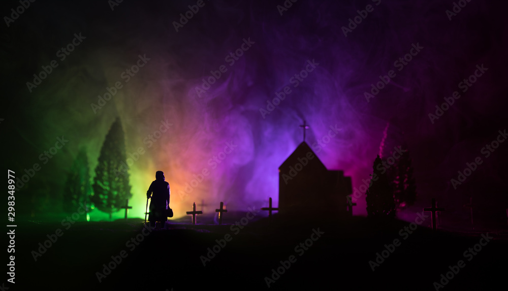 Fototapeta premium Diffuse entities walking on a street from an old European cemetery in moonlit night