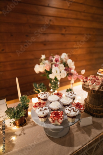 Sweet dessert in a cups at wedding reception.