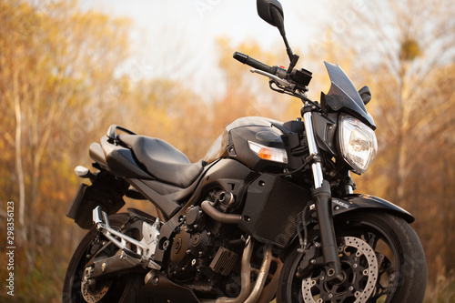 Stylish black sports bike on the street.
