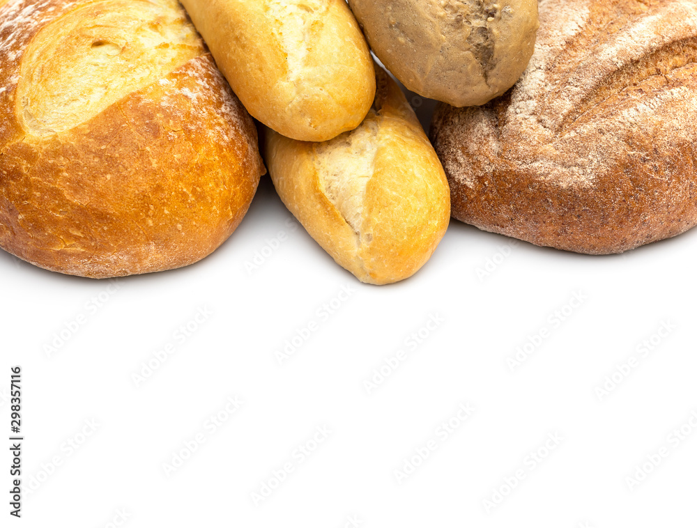 Heap of different loaf of bread on white. Space for text.