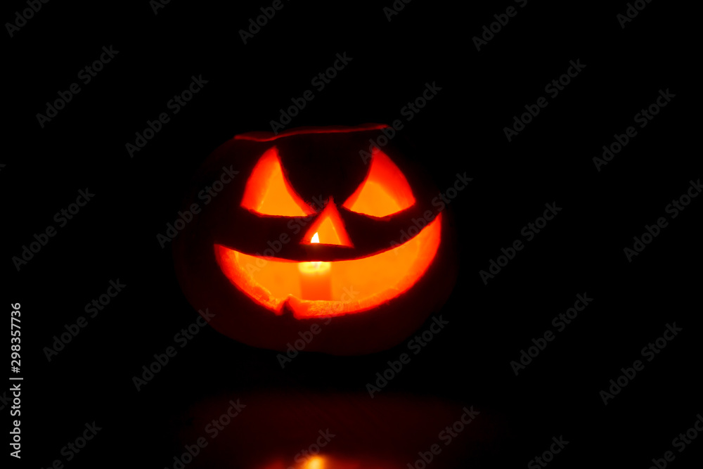 Jack o lantern in the forest by night. Halloween concept