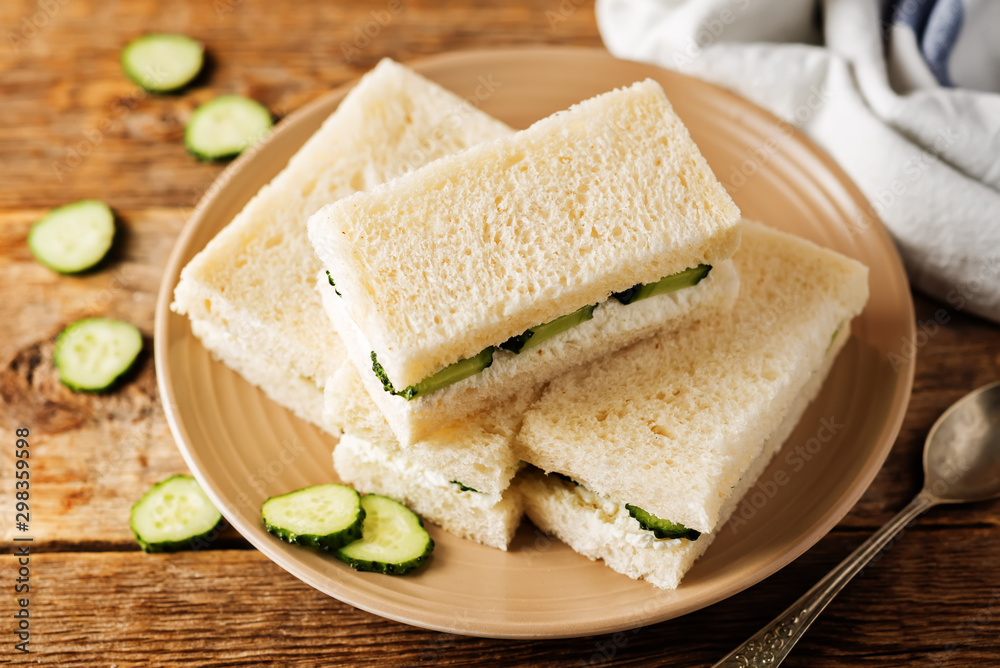 Cucumber cream cheese sandwiches on the plate