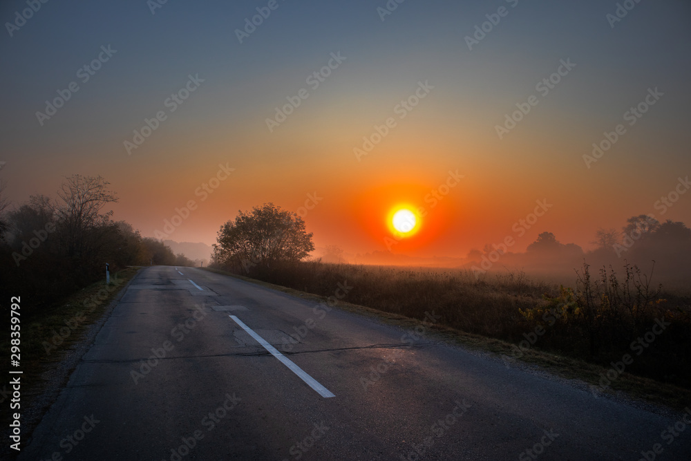 Sunrise on road in canyon at autumn. Road by the Danube river in Serbia.