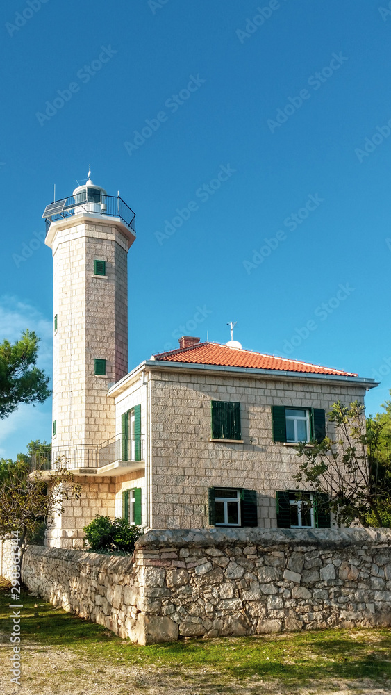 lighthouse at the sea. Lanterna Beach, Vir, Croatia