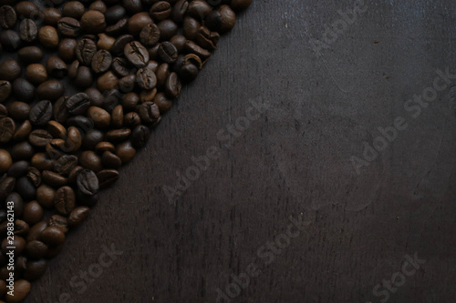 Coffee beans on brown background