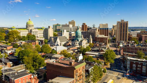 Afternoon light hits the buildings and downtown city center area in Pennsylvania state capital at Harrisburg photo