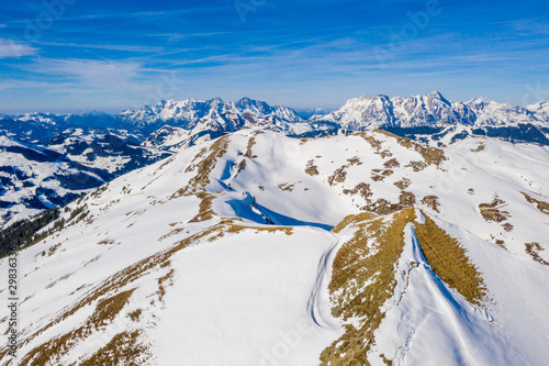 Alpine mountains range landscape in beauty French, Italian and Swiss ALPS seen from the plane. Ski resort Chamonix Mont Blanc. The mountain is the highest in the Alps and the European Union.