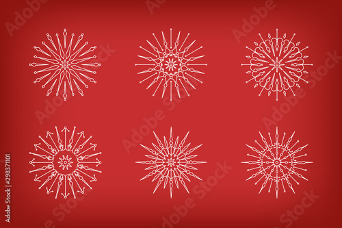 Intricate holiday sunburst designs on red background