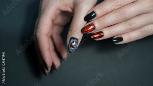 Nails Art Design. Hands With Manicure. Close Up Of Female Hands With Trendy Nails with decorations.