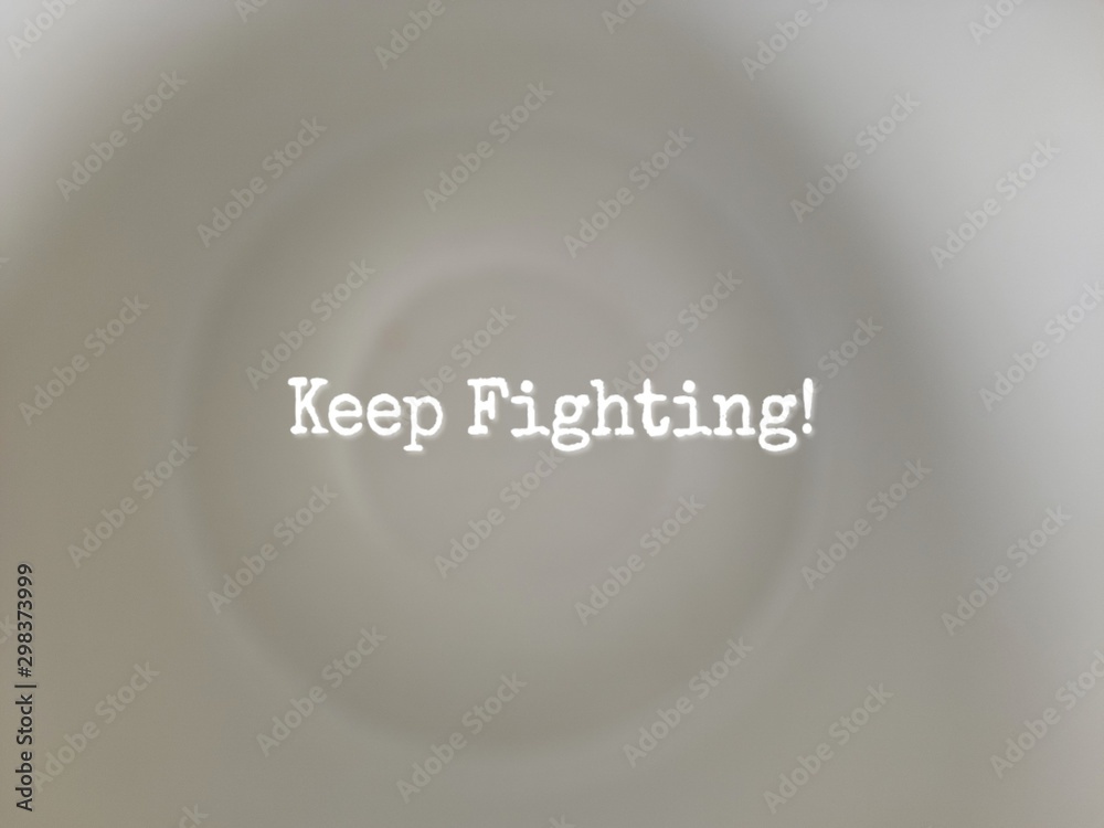 Obraz premium inspirational words of keep fighting