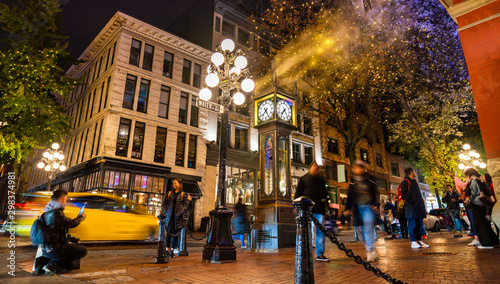 Fototapeta Naklejka Na Ścianę i Meble -  Vancouver, British Columbia, Canada. 09. 01. 2018. Empty streets on a chilly night, Gastown steam clock steaming as it gets close to midnight.