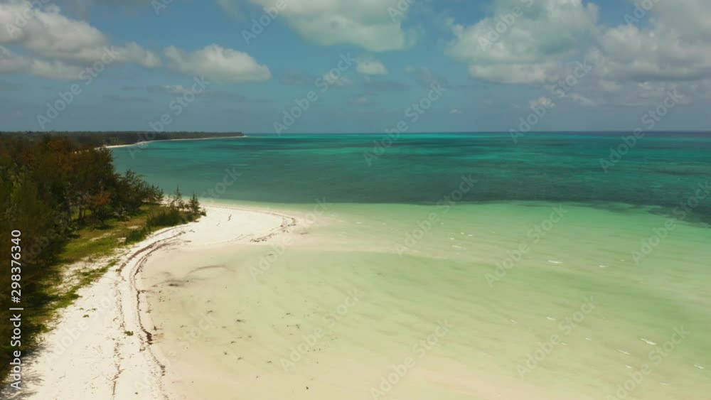 Travel concept: blue sea and sand beach on a tropical island. Punta Sebaring, Balabac, Palawan. Summer and travel vacation concept. Travel concept: blue sea and sand beach on a tropical island. Punta Sebaring, Balabac, Palawan. Summer and travel vacation concept.