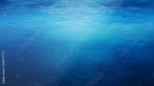 Underwater Near Ocean Surface with Rising Bubbles in Blue Sea - Abstract Background Texture