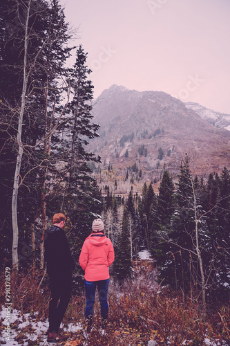 Cute young couple in the mountains exploring