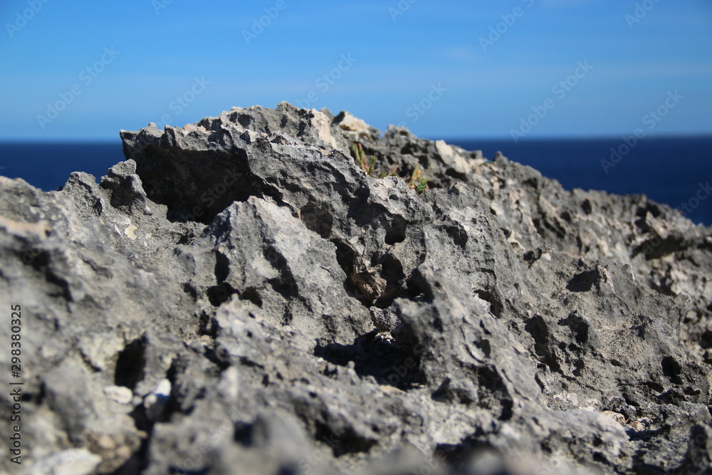 rock with the sea in the background rock with the sea in the background