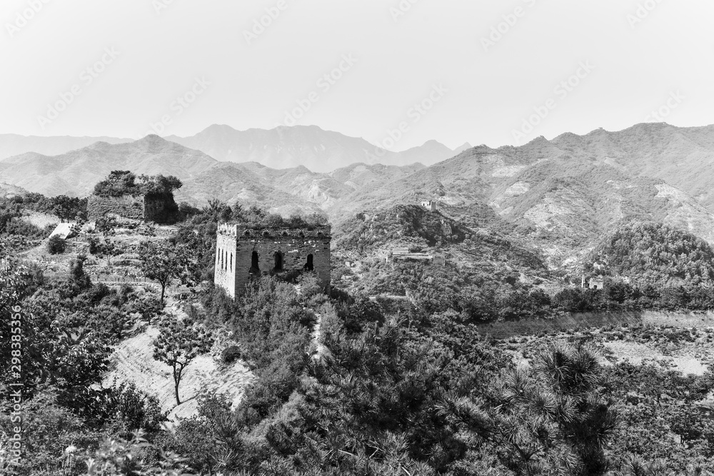 A close-up of the observation window of the beacon tower of the Great Wall, ancient China, in yumuling, Qianxi County, Hebei Province, China. Black and white monochrome.
