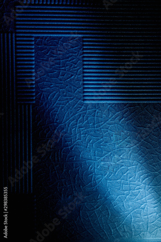 Fototapeta Naklejka Na Ścianę i Meble -  Light blue background with a pattern illuminates a diagonal ray of light