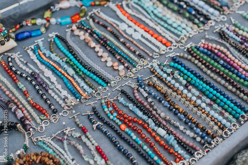 Set of natural material bracelets and necklaces on market display