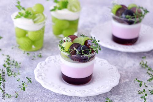 Homemade autumn glass desserts with grapes