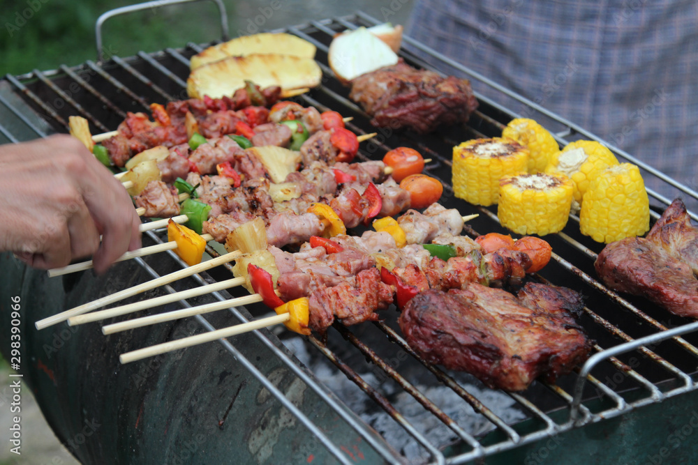 Barbeque Grill Street Food in thailand,Eat outdoors in a happy family. Barbeque Grill Street Food in thailand,Eat outdoors in a happy family.