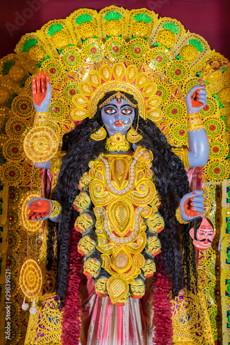 Idol of Goddess Maa Kali at a decorated puja pandal in Kolkata, West Bengal, India. Kali puja also known as Shyama Puja is a famous religious festival of Hinduism.