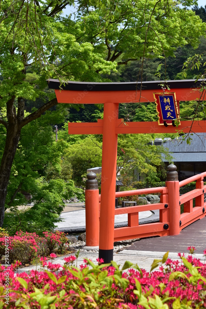 Benten-style torii in Japanese garden Benten-style torii in Japanese garden