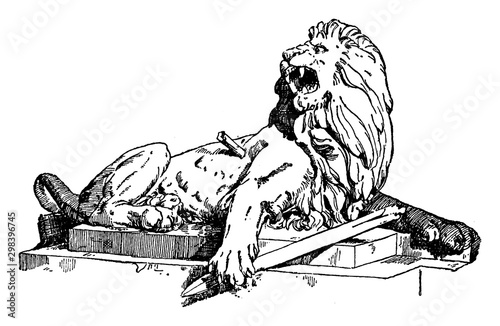 Wounded Lion is a sculpture found in Kriegerdenkmal, vintage engraving.