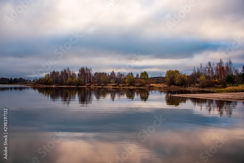 Twilight over the river and forest. Landscape of the middle plain of Russia. 