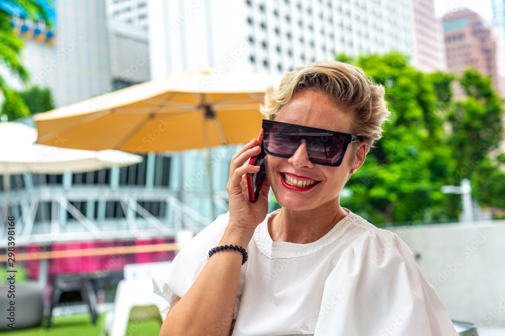 Portrait Caucasian business woman talking on mobile phone Portrait Caucasian business woman talking on mobile phone