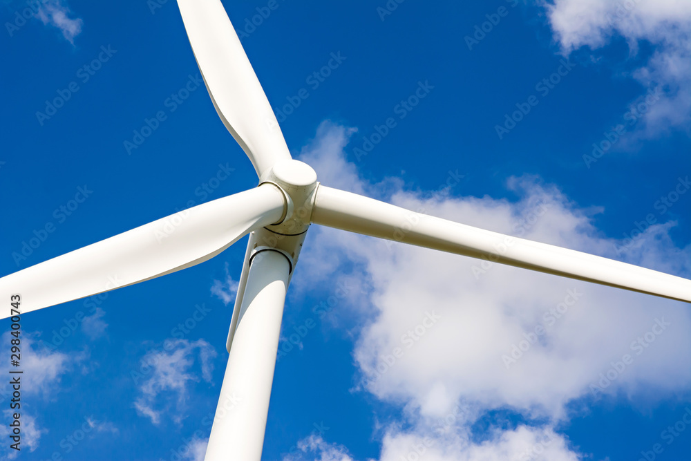 Wind turbine is alternative electrical power with blue sky, summer field, renewable energy Wind turbine is alternative electrical power with blue sky, summer field, renewable energy