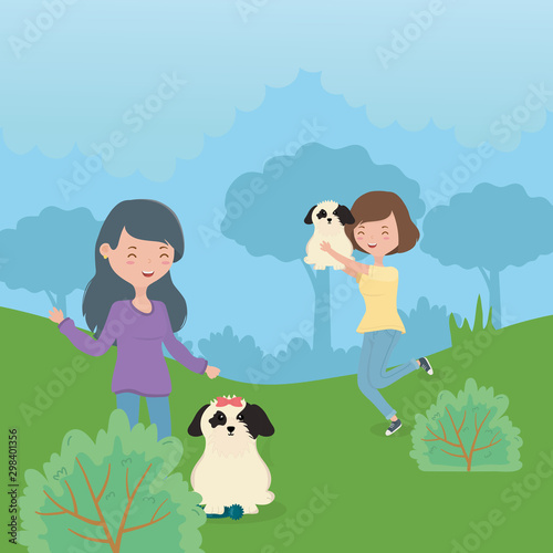 women with dogs playing park pet care