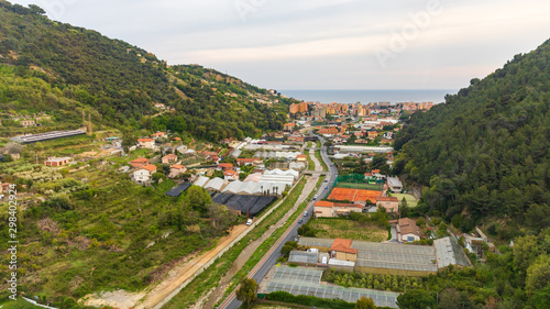 Village at dusk on Mediterranean sea shore in Italy