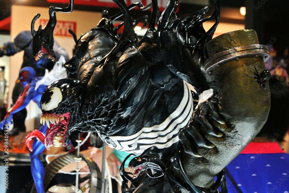 Naklejka premium KUALA LUMPUR, MALAYSIA -APRIL 7, 2018: Selected focused on Marvel Comic action figure called Venom. Supervillain against Spider-man. Action figures displayed by the collector. 