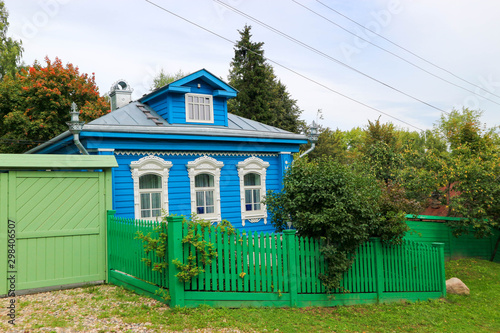 Beautiful russian blue wooden house in the village garden, Plyos, Russia