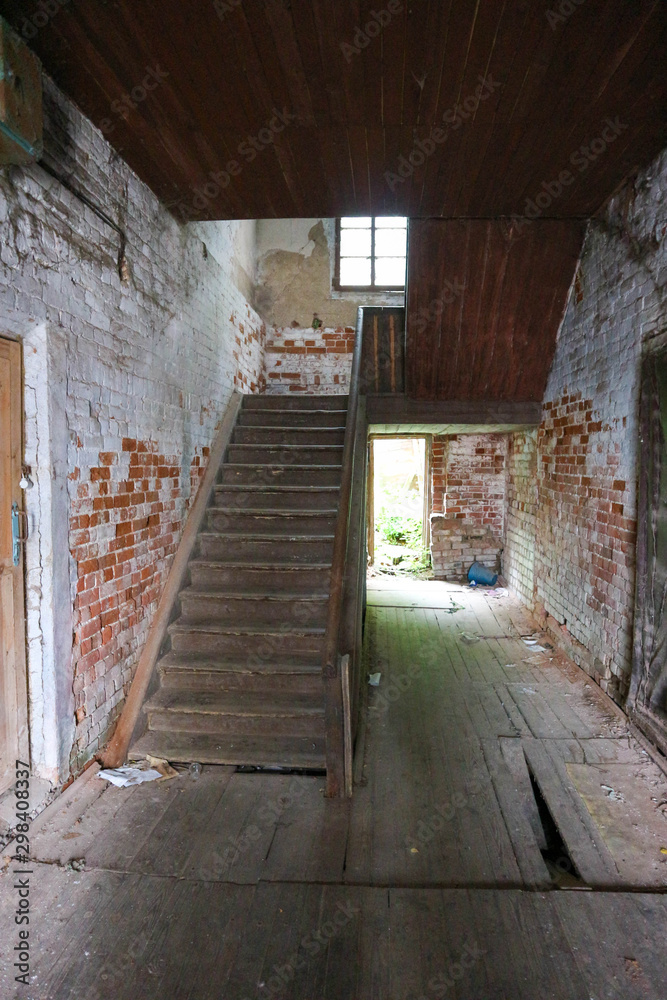 Stairway in old abandoned brick house Stairway in old abandoned brick house