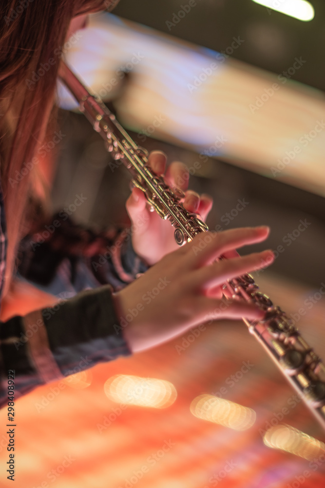 Fototapeta premium woman playing flute