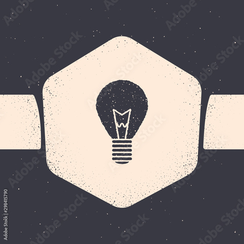 Grunge Light bulb with concept of idea icon isolated on grey background. Energy and idea symbol. Inspiration concept. Monochrome vintage drawing. Vector Illustration